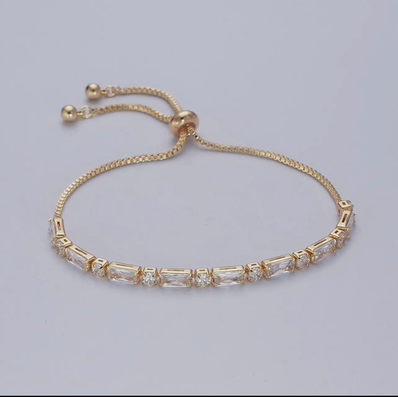 24K Gold Filled Bracelet with Clear
Baguette Cubic Zirconia
