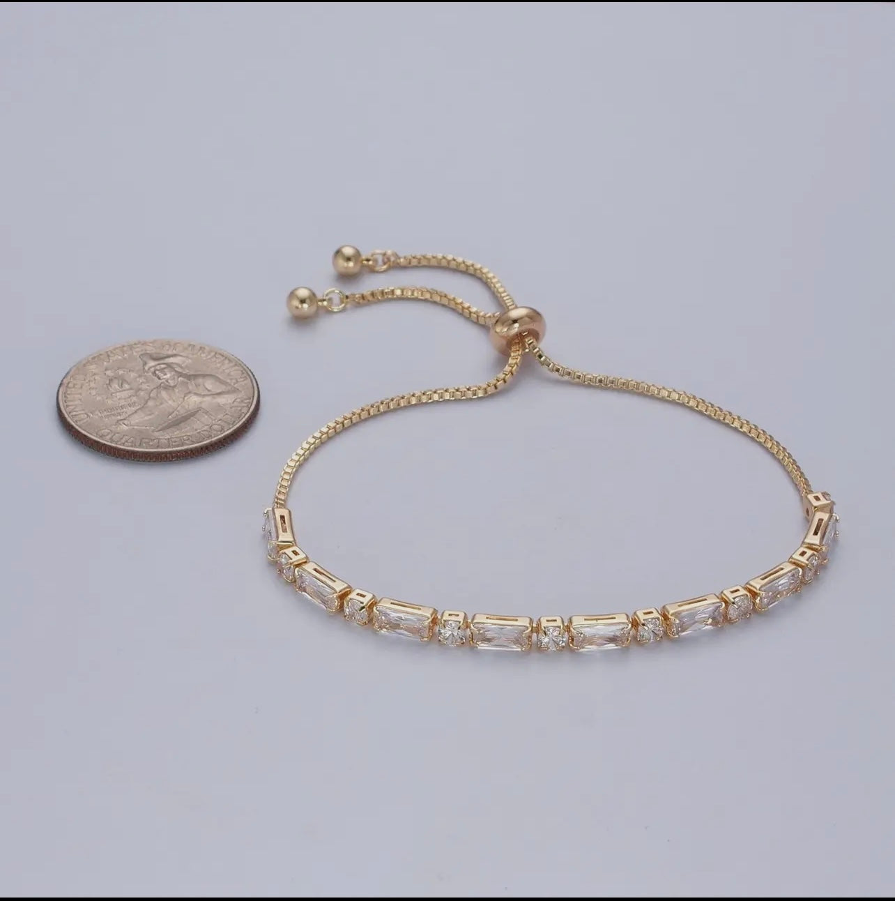 24K Gold Filled Bracelet with Clear
Baguette Cubic Zirconia